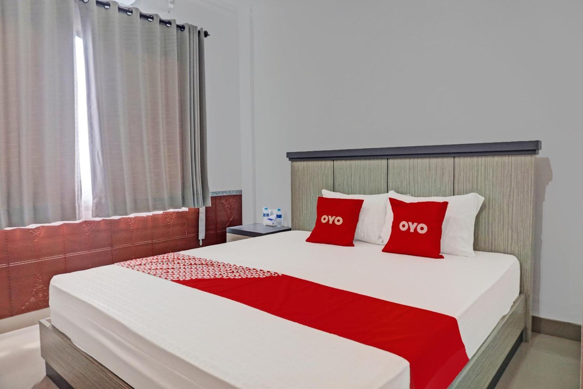 Super Oyo 92518 De Luna Hotel Banjarbaru Bagian luar foto